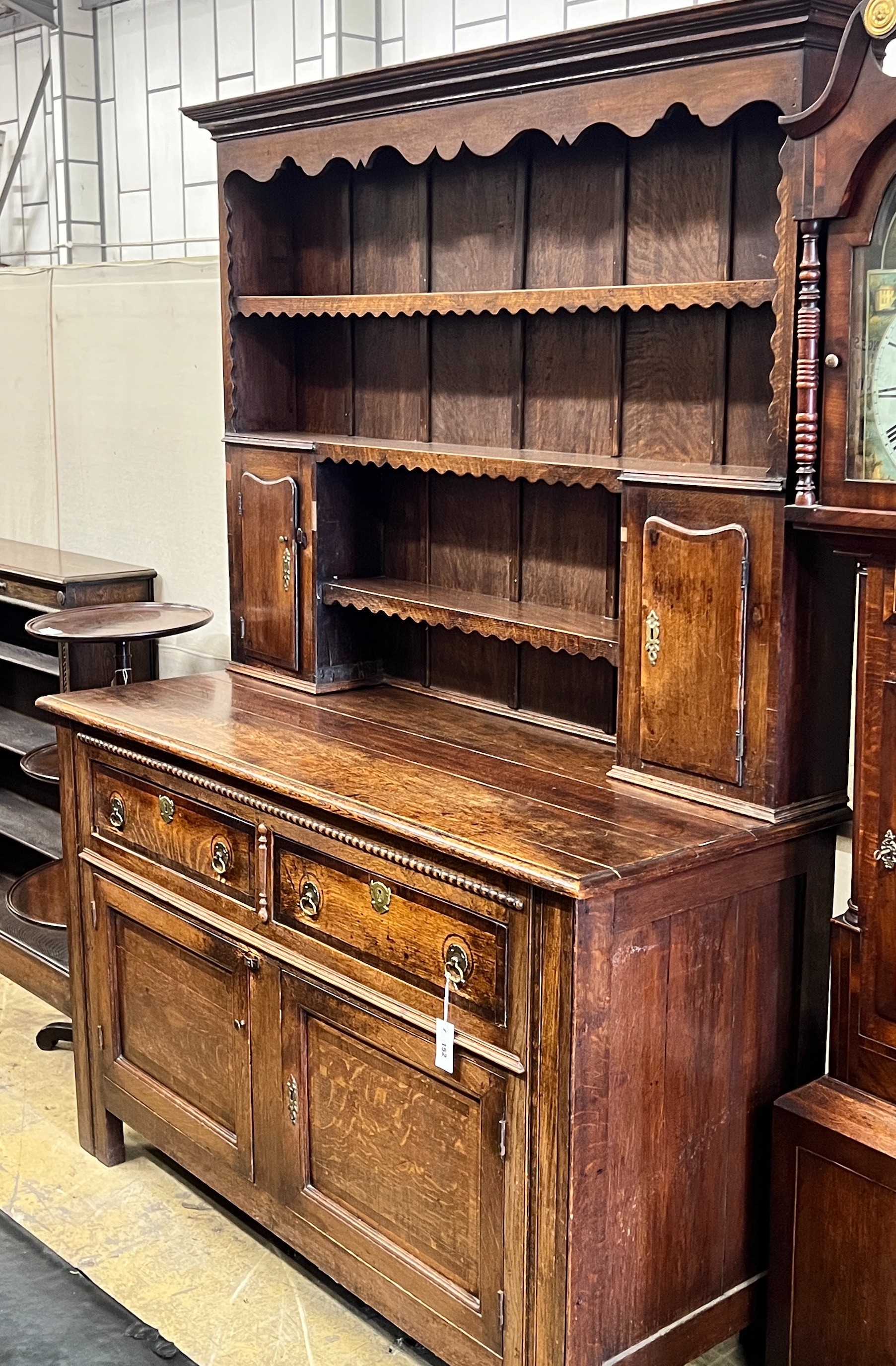 A Victorian oak dresser with boarded rack, width 148cm, depth 58cm, height 206cm